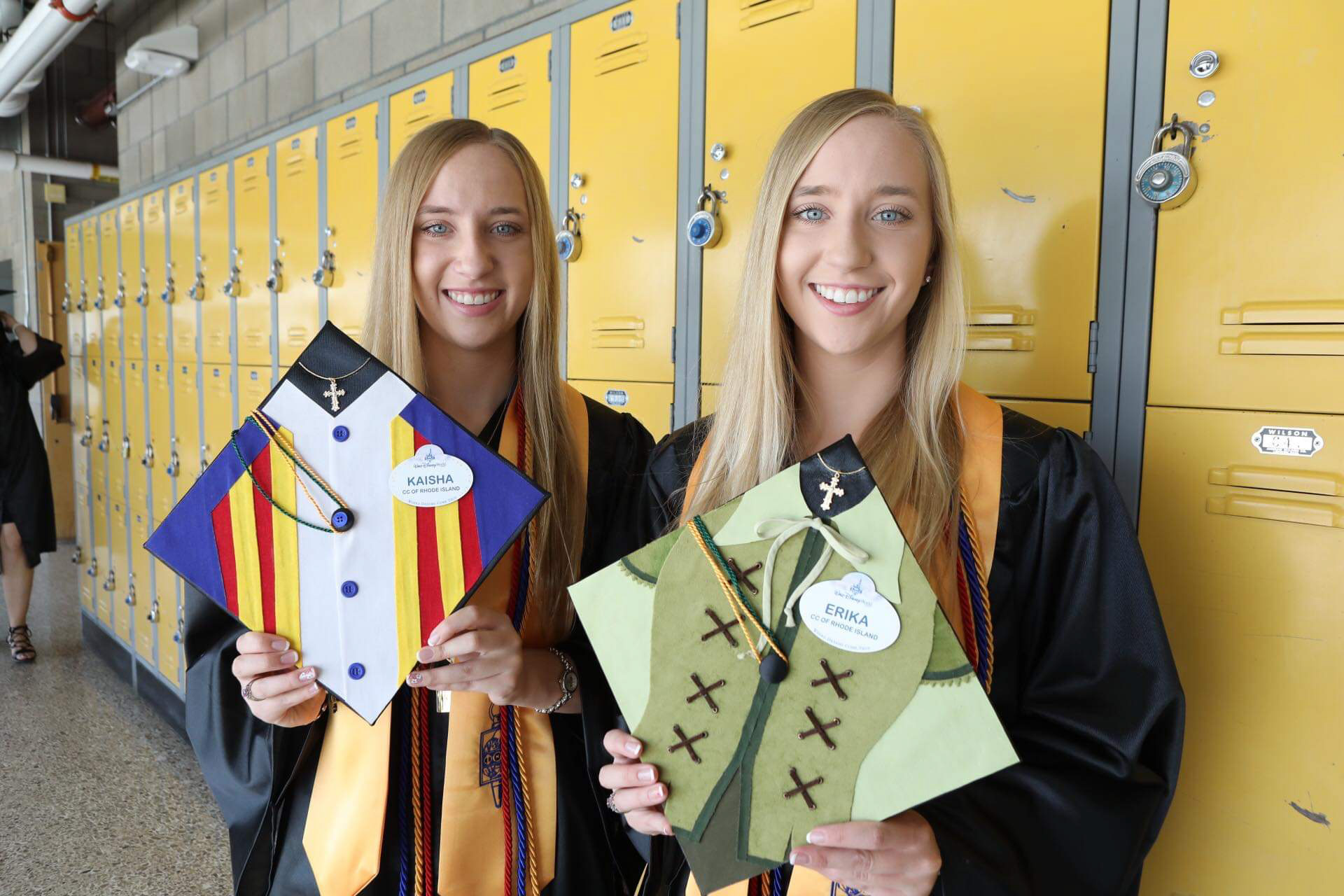 Students-Kaisha-(left)-and-Erika-Girard-at-graduation-in-RI-Disney-decorated-caps